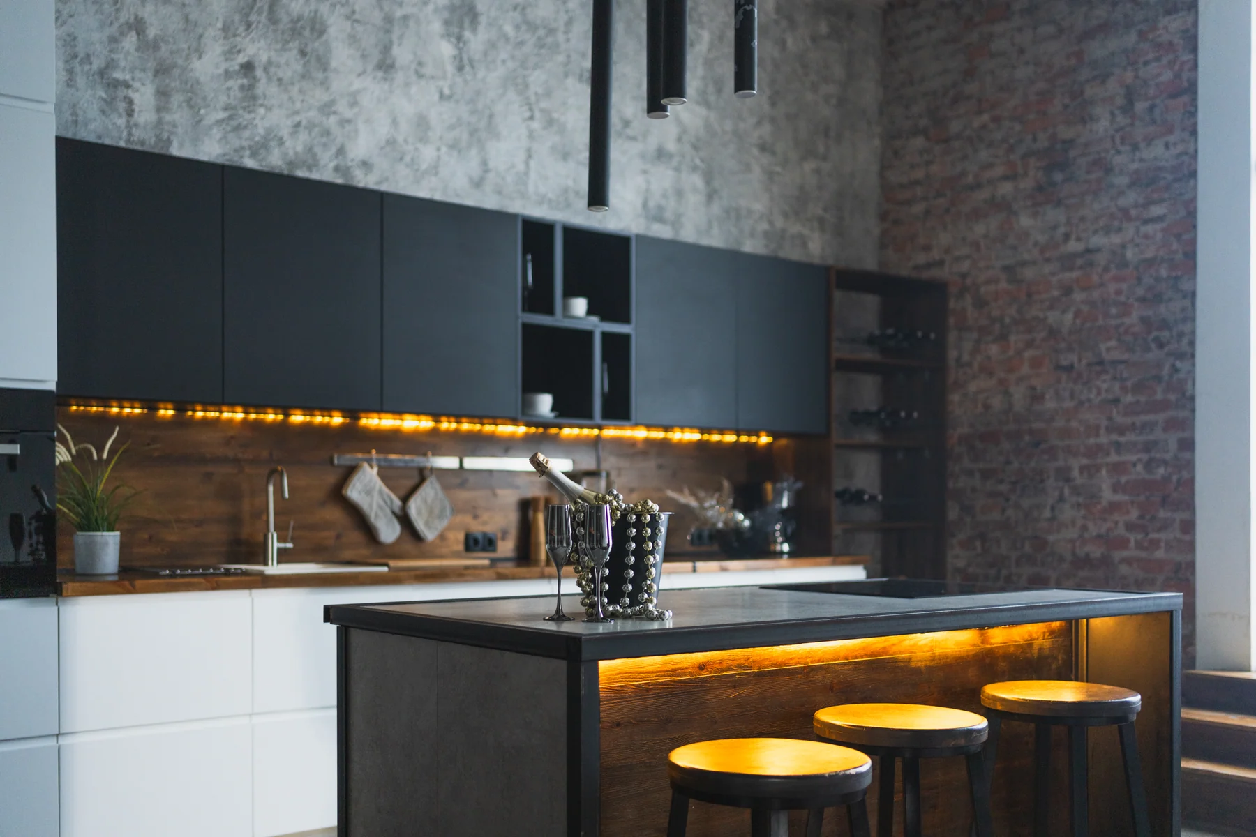 Dark modern kitchen representing a thoughtful Midlands home search